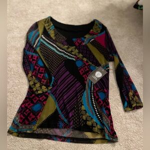 Women’s top 
Size large 
Multi colored 
Sheer 
Black underlay